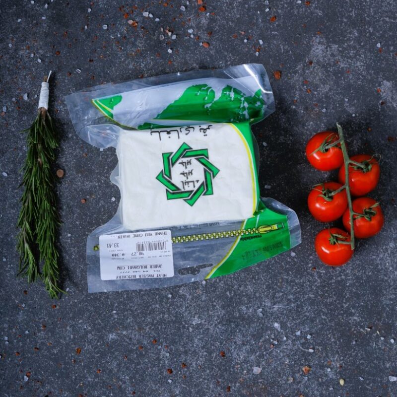 White cheese block in vacuum packaging with green label - fresh dairy at The Meat Master Butchery