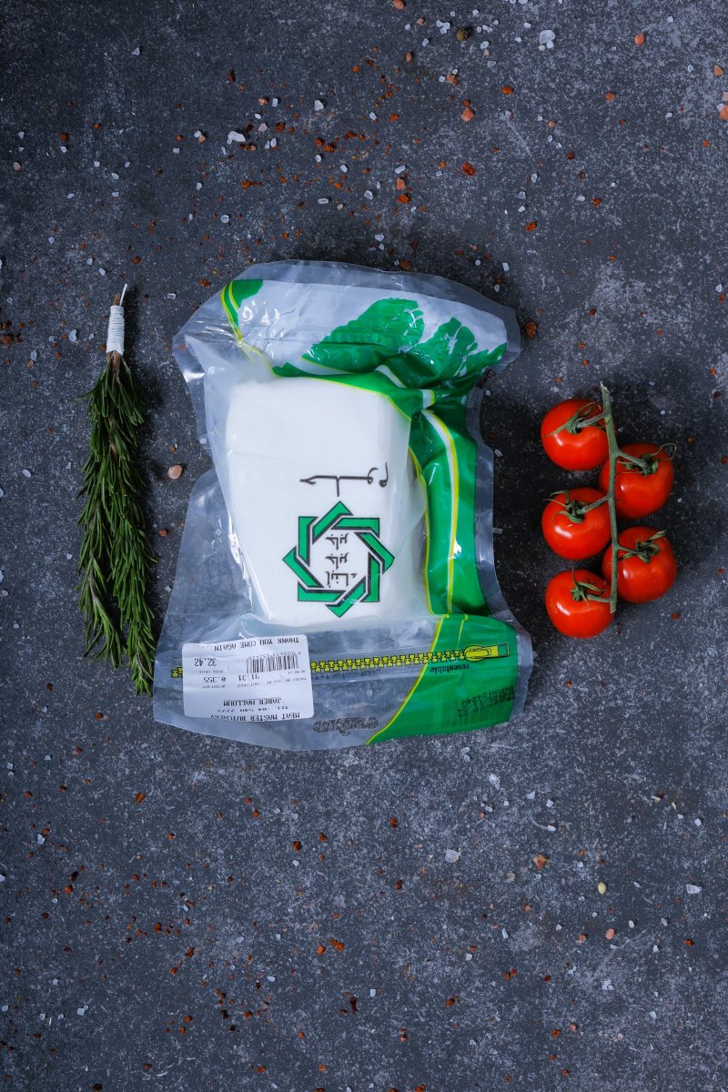 White cheese block in green vacuum packaging large size - fresh dairy at The Meat Master Butchery
