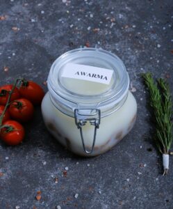 Glass jar of awarma (Lebanese preserved lamb confit in fat) - specialty at The Meat Master Butchery